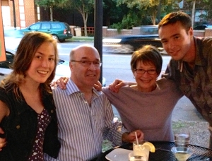 Lynn Casey with her family, dining at a street cafe in Minneapolis.