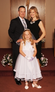 Jill blends the Seven Fs by strengthening relationships with Faith and Family - here is the family at her daughters First Communion.