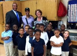 Kevin and Greta Warren (top left) ensure every student at the Lucy Laney school in Minneapolis have fully-stocked backpacks every year.