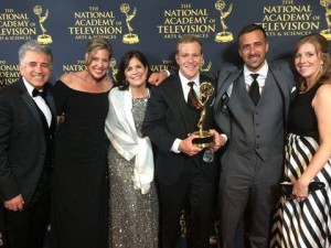 Emmy award winning Colleen Needles Steward (center) poses with cast and producers of Tremendous! Entertainment.