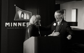 Maureen celebrated with Richard Davis of US Bank, when Minnesota won the 2018 bid to host the Super Bowl.