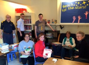 My fellow members of the MInneapolis City of Lakes Rotary Club are making good on their goal to collect and distribute 10,000 books to Minneapolis kids.