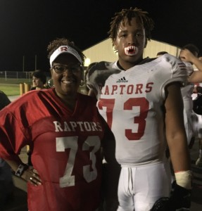Rita with her son at a football game